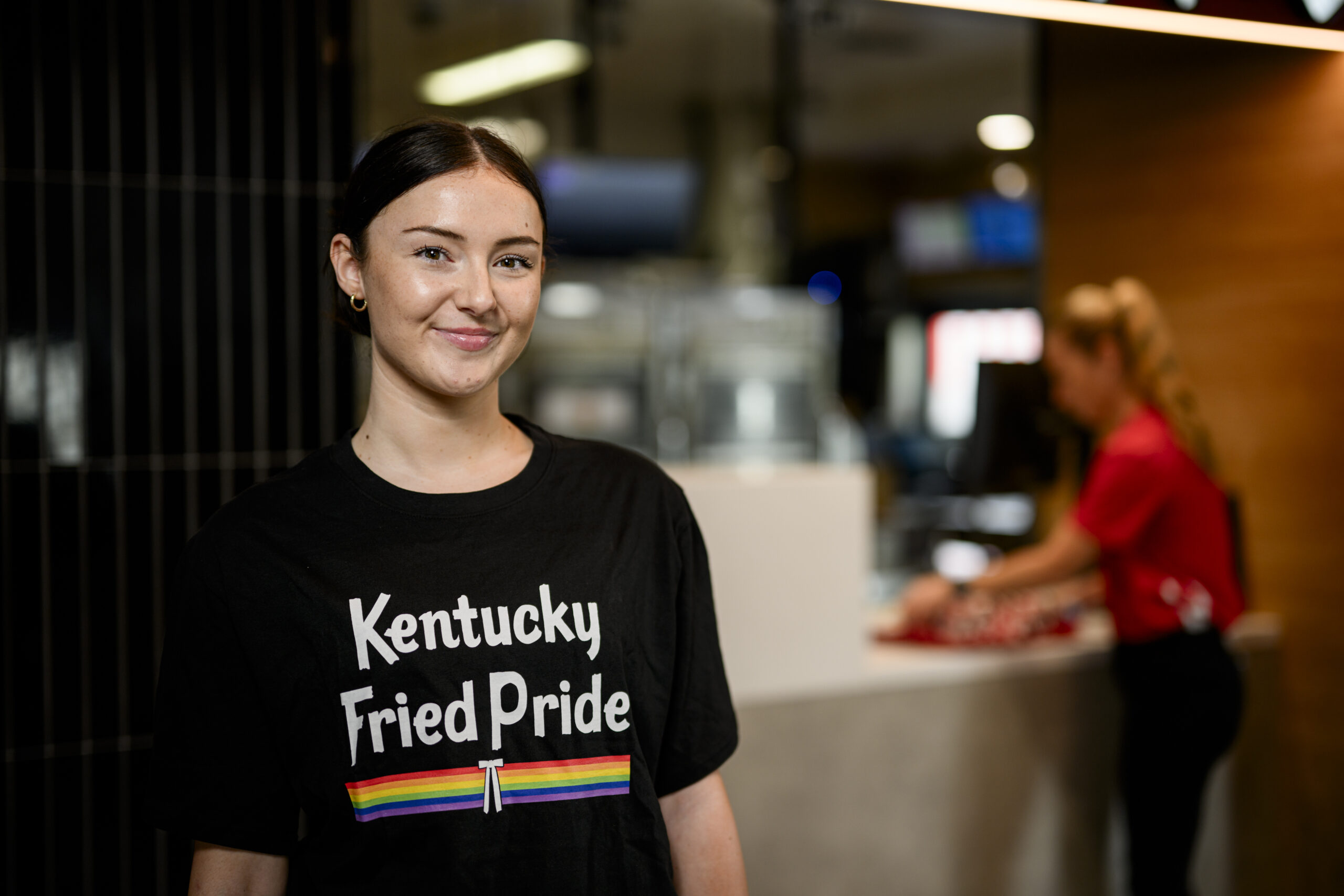 Young female KFC worker in resturant